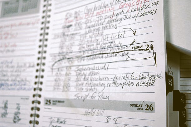 Frustrated technician buried in paperwork